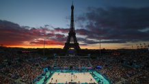 Temporary seating setup at the base of the Eiffel Tower allowed Paris to create one of the most iconic beach volleyball courts in the world.