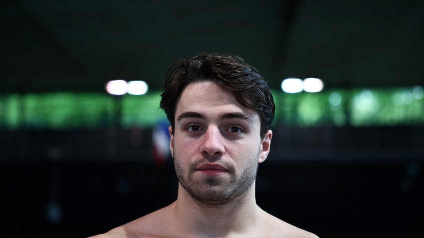 France’s Jules Bouyer poses after a diving training session ahead of the Paris 2024 Olympic and Paralympic Games, at France’s National Institute of Sport, Expertise, and Performance (INSEP) in Paris on April 15, 2024. (Photo by Anne-Christine POUJOULAT / AFP) (Photo by ANNE-CHRISTINE POUJOULAT/AFP via Getty Images)