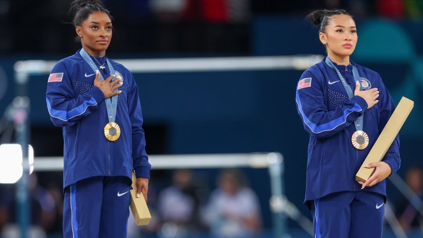 Gold medalist and winner Simone Biles of USA and bronze medalist Suni Lee