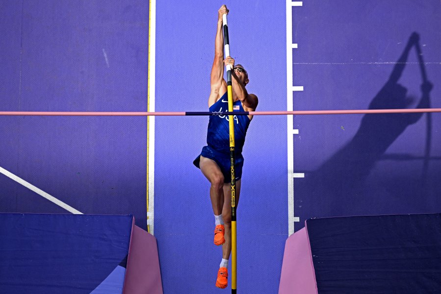 Sam Kendricks competing in the men's pole vault