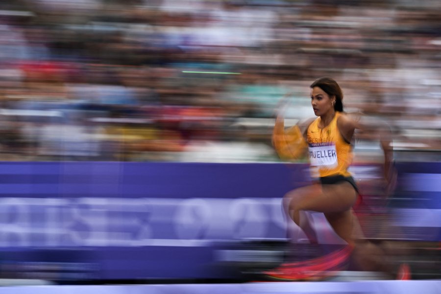 Germany's Laura Raquel Mueller competes in the women's long jump qualification of the athletics event at the Paris 2024 Olympic Games at Stade de France in Saint-Denis, north of Paris, on August 6, 2024