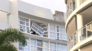 Image shows the damage after a helicopter crashed into the roof of a Hilton hotel in Australia