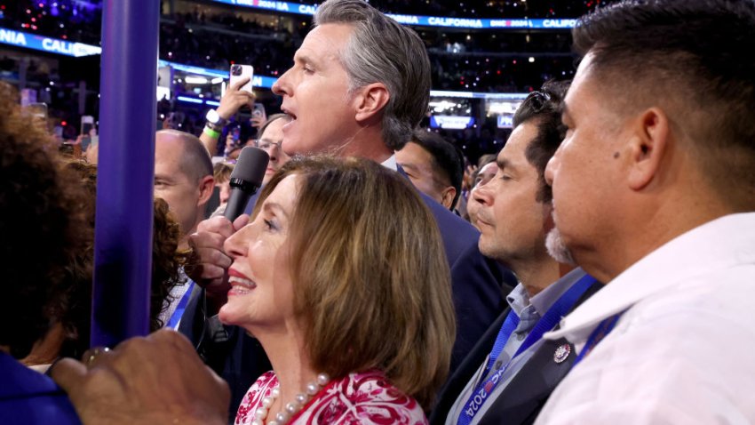 DNC CHICAGO, IL AUGUST 20, 2024  California Gov. Gavin Newsom casts votes for Democratic presidential nominee Vice President Kamala Harris along with Rep. Nancy Pelosi, front center, during the Democratic National Convention Tuesday, Aug. 20, 2024, in Chicago. (Robert Gauthier/Los Angeles Times via Getty Images)