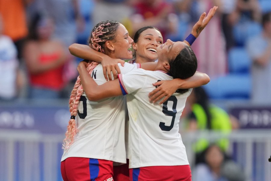 Sophia Smith of the United States celebrates scoring with teammates