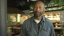 Nigel Jones stands in his Oakland Jamaican restaurant Calabash, which recently had two windows broken by vandals. (Sept. 16, 2024)