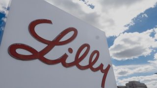 A sign with the company logo sits outside of the headquarters of Eli Lilly in Indianapolis, Indiana, on March 17, 2024.