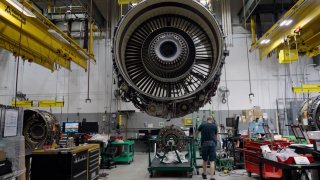 American Airlines workers perform maintenance on CFM-56 engine in Tulsa, Oklahoma