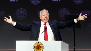 Democratic vice presidential nominee Minnesota Gov. Tim Walz speaks on stage during the International Association of Fire Fighters (IAFF) Convention on August 28, 2024 in Boston, Massachusetts. 