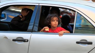 Cars sit in traffic as people flee the southern villages amid ongoing Israeli airstrikes, in Sidon, Lebanon, Monday, Sept. 23, 2024.