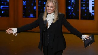 FILE – Barbra Streisand presents the award for best musical at the Tony Awards in New York on June 12, 2016.