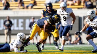 BERKELEY, CALIFORNIA – AUGUST 31: Byron Cardwell #21 of the California Golden Bears rushes for yardage against the UC Davis Aggies in the 2nd half at California Memorial Stadium on August 31, 2024 in Berkeley, California. (Photo by Thien-An Truong/ISI Photos/Getty Images)