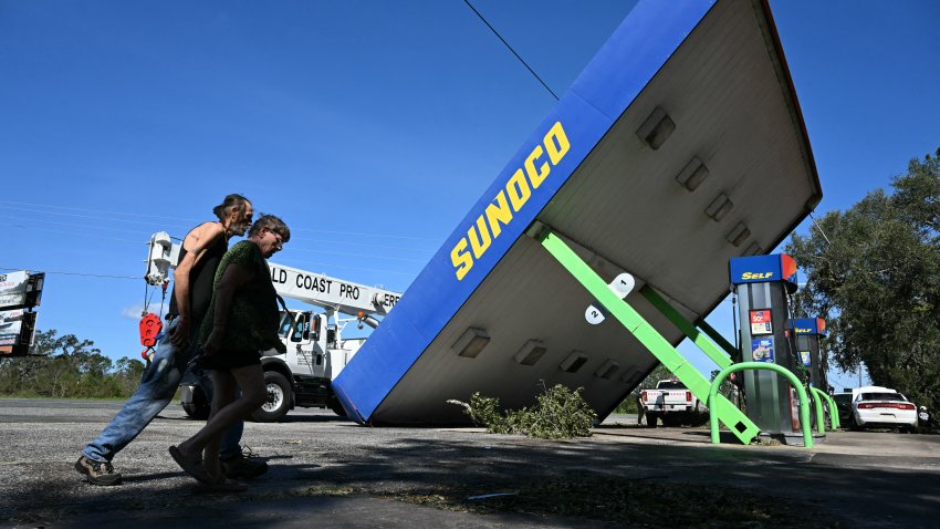 A rooftop of a Sunoco gas station destroyed