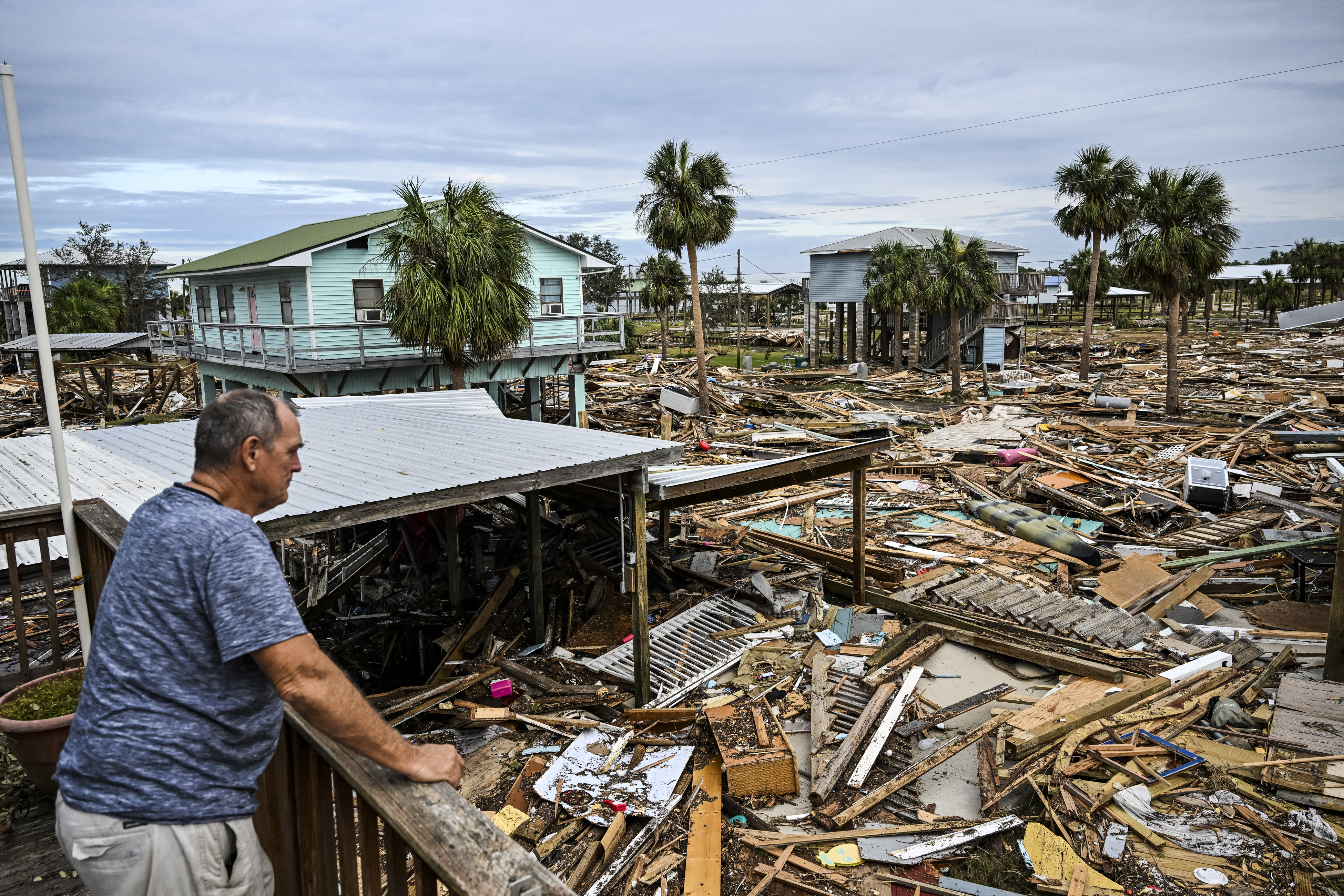 David Hester inspects damages of his house after Hurricane Helene made landfall in Horseshoe Beach, Florida, on September 28, 2024.