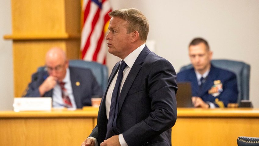 OceanGate's former director of marine operations, David Lochridge, center, stands during his testimony, Tuesday, Sept. 17, 2024, for the Titan marine board formal hearing inside the Charleston County Council Chambers, in North Charleston, S.C.