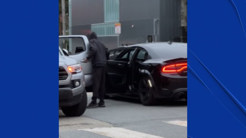 A video captured by neighbor Mark Dietrich shows masked individuals breaking into a truck in the Richmond District.