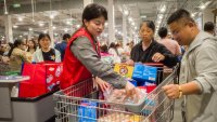 Customers shop at the new store of Costco on May 28, 2024 in Nanjing, Jiangsu Province of China.