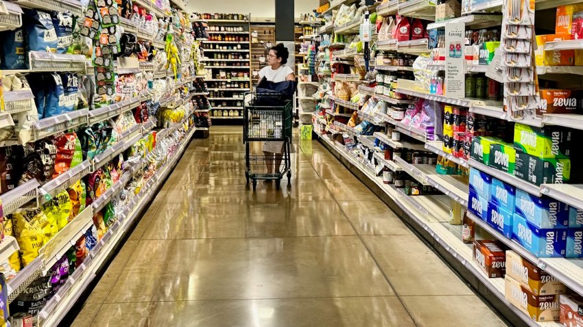 A customer shops at a Whole Foods grocery store in Edgewater, N.J. on Sept. 11th, 2024. 