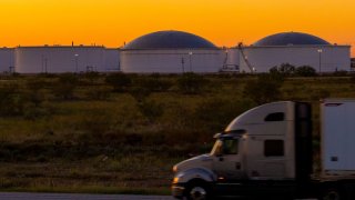 Oil storage containers in Midland, Texas, US, on Thursday, Oct. 3, 2024. 