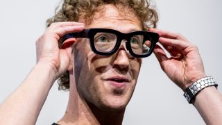 Mark Zuckerberg, chief executive officer of Meta Platforms Inc., wears Orion augmented reality (AR) glasses during the Meta Connect event in Menlo Park, California, US, on Wednesday, Sept. 25, 2024. Meta Platforms Inc. debuted its first pair of augmented reality glasses, devices that show a combined view of the digital and physical worlds, a key step in Chief Executive Officer Mark Zuckerberg’s goal of one day offering a hands-free alternative to the smartphone. Photographer: David Paul Morris/Bloomberg via Getty Images