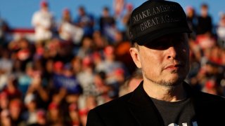 Elon Musk wears a black “Make America Great Again” cap while attending a campaign rally with Republican presidential nominee and former President Donald Trump at the Butler Farm Show fairgrounds in Butler, Pennsylvania, on Oct. 5, 2024.