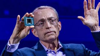 Intel CEO Pat Gelsinger holds an artificial intelligence processor as he speaks during the Computex conference in Taipei, Taiwan, on June 4, 2024.