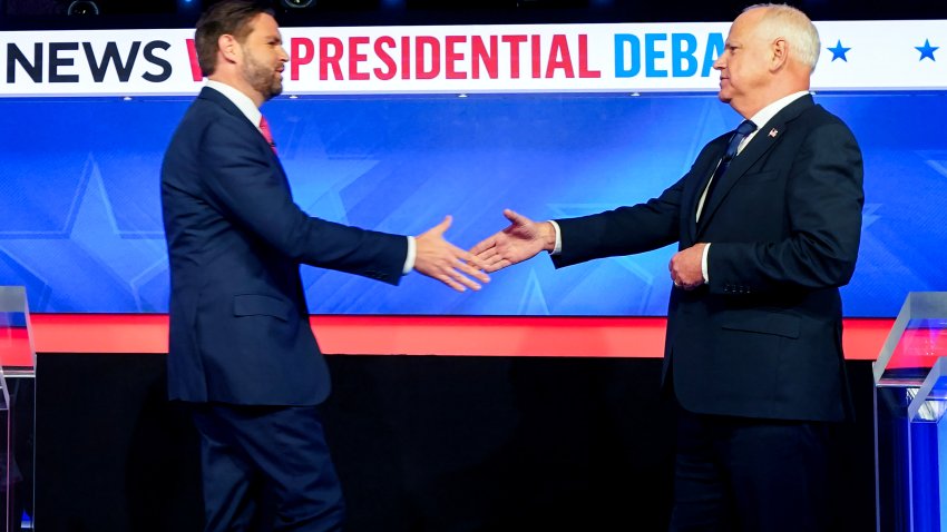 Senator JD Vance, a Republican from Ohio and Republican vice-presidential nominee, left, and Tim Walz, governor of Minnesota and Democratic vice-presidential nominee, shake hands while arriving for the first vice presidential debate at the CBS Broadcast Center in New York, US, on Tuesday, Oct. 1, 2024. Historically, debates between the running mates of the major party nominees for president have a negligible effect on the contest for the White House, but with the race between Republican Donald Trump and Democrat Kamala Harris being so close, any boost for either ticket could make all the difference. Photographer: Al Drago/Bloomberg via Getty Images