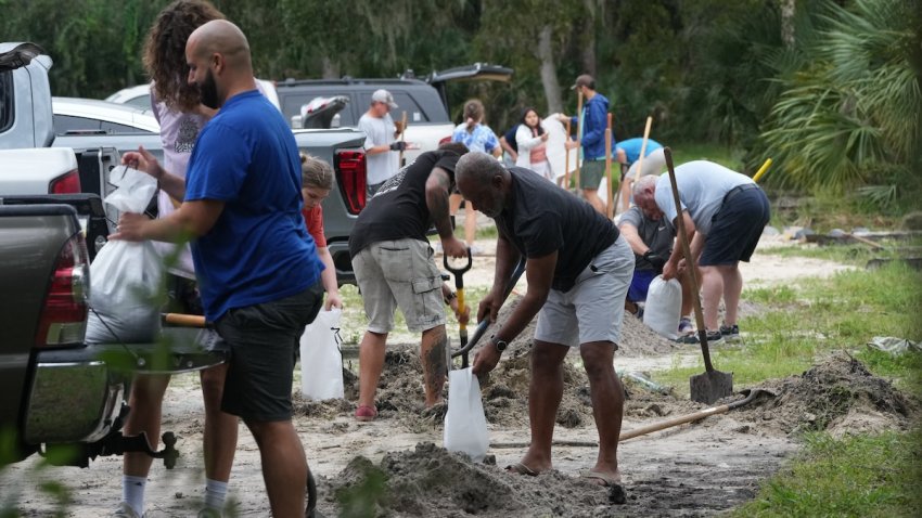 Pinellas County residents fill sandbags at John Chestnut Park in Palm Harbor, Florida on Oct. 6, 2024. Florida’s governor has declared a state of emergency on Saturday as forecasters warned that Hurricane Milton is expected to make landfall later this week.