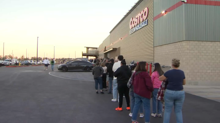 Customers line up outside a new Costco store in Napa.