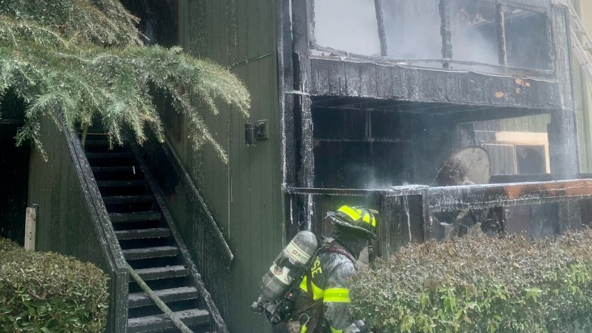 Firefighters battle an apartment fire in San Jose.