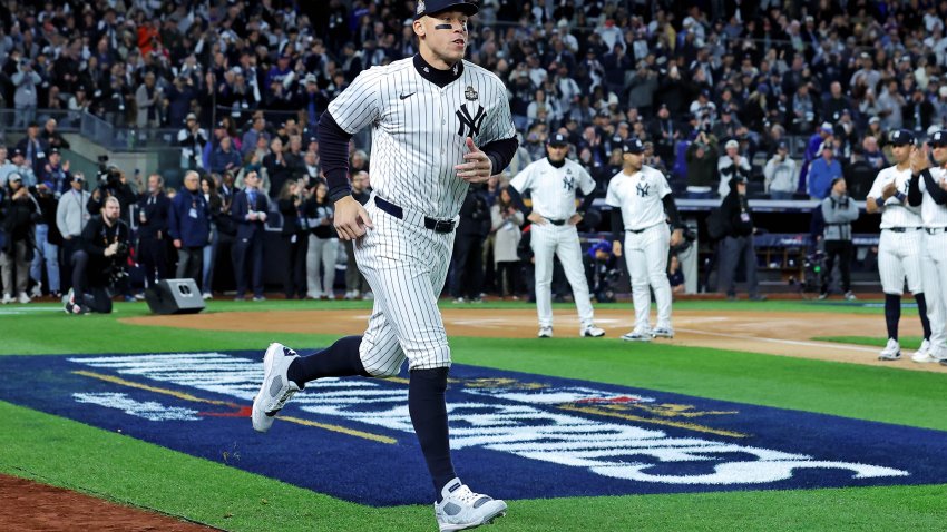 Oct 28, 2024; New York, New York, USA; New York Yankees outfielder Aaron Judge (99) is introduced before playing against the Los Angeles Dodgers in game three of the 2024 MLB World Series at Yankee Stadium. Mandatory Credit: Brad Penner-Imagn Images