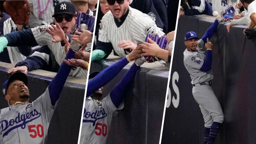 Two fans were ejected at Yankee Stadium in an unusual case of fan interference during a Game 4 of the World Series.