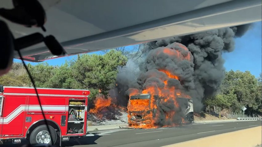 An RV became full engulfed in Poway, spreading to nearby brush on Oct. 12, 2024. (Candace Barbieri)