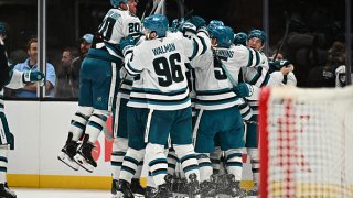 SALT LAKE CITY, UTAH – OCTOBER 28: The San Jose Sharks celebrate after defeating the Utah Hockey Club 5-4 in overtime on October 28, 2024 at Delta Center in Salt Lake City, Utah. (Photo by Jamie Sabau/NHLI via Getty Images)