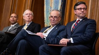 From left, House Minority Leader Hakeem Jeffries, D-N.Y., Senate Minority Leader Mitch McConnell, R-Ky., Senate Majority Leader Charles Schumer, D-N.Y., and Speaker of the House Mike Johnson, R-La., attend a Menorah lighting to celebrate the eight-day festival of Hanukkah, in the U.S. Capitol on Tuesday, December 12, 2023. 