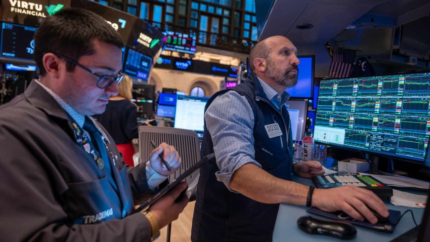 Traders work on the New York Stock Exchange (NYSE) floor on November 12, 2024 in New York City.