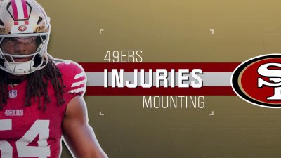 49ers' mounting injuries include Warner's surprising ankle fracture