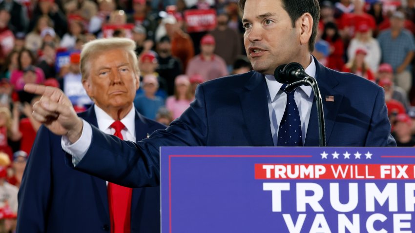 RALEIGH, NORTH CAROLINA – NOVEMBER 04:  Republican presidential nominee, former U.S. President Donald Trump watches as U.S. Sen. Marco Rubio (R-FL) speaks during a campaign rally at the J.S. Dorton Arena on November 04, 2024 in Raleigh, North Carolina. With one day left before the general election, Trump is campaigning for re-election in the battleground states of North Carolina, Pennsylvania and Michigan.