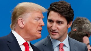 FILE - U.S. President Donald Trump, left, and Canadian Prime Minister Justin Trudeau talk prior to a NATO round table meeting at The Grove hotel and resort in Watford, Hertfordshire, England, Dec. 4, 2019.