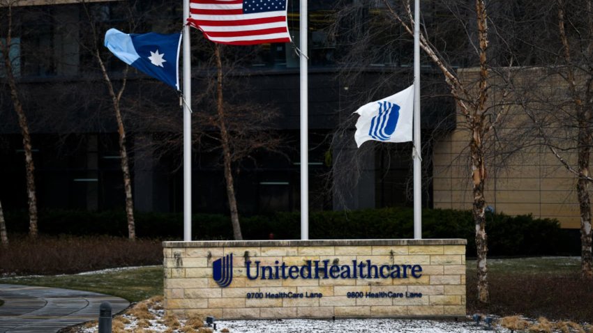 Flags fly at half mast outside the United Healthcare corporate headquarters on December 4, 2024 in Minnetonka, Minnesota. 