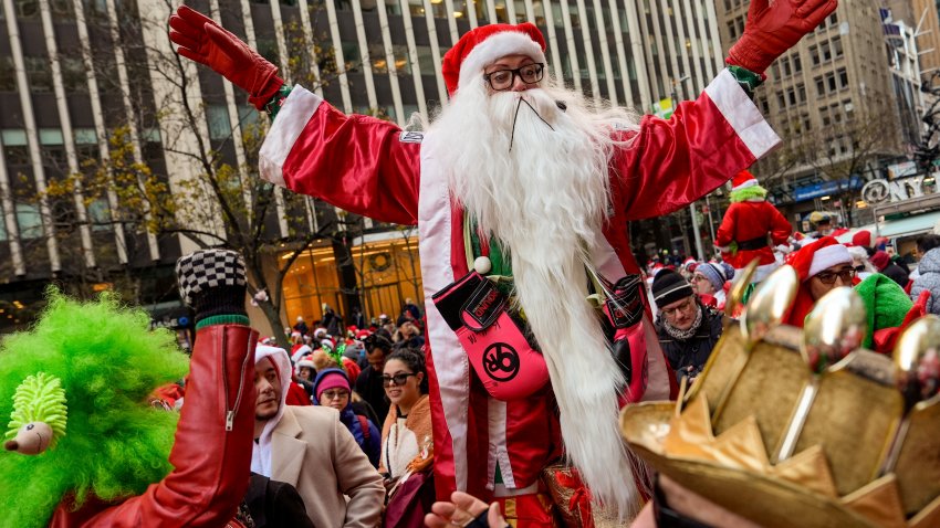 Revellers take part in SantaCon, Saturday, Dec. 14, 2024, in New York.