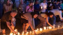 Relatives of victims of the 2004 Indian Ocean tsunami hold a candle light vigil as they participate on the 20th anniversary, at Tsunami Memorial Park at Ban Nam Khem, Takuapa district of Phang Nga province, southern Thailand, Thursday, Dec. 26, 2024. (AP Photo/Wason Wanichakorn)