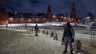 Servicemen of Rosguardia (National Guard) guard an area near Red Square prior to celebrating the New Year’s Day, in Moscow, Russia, Dec. 31, 2024.