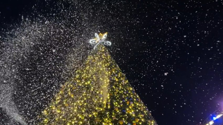 Artificial snow falls down behind the 90-foot-tall holiday tree at Thrive City in San Francisco. November 30, 2024. NBC Bay Area Photo/ Jaime Hinojosa.