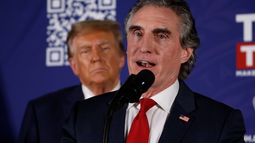 LACONIA, NEW HAMPSHIRE – JANUARY 22: North Dakota Governor Doug Burgum encourages voters to support Republican presidential candidate and former President Donald Trump during a campaign rally in the basement ballroom of The Margate Resort on January 22, 2024 in Laconia, New Hampshire. Burgum ran against Trump for the Republican presidential nomination but later dropped out and endorsed him. Trump is rallying supporters the day before New Hampshire voters will weigh in on the Republican nominating race with the first-in-the-nation primary.