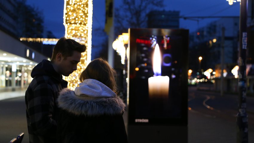 Magdeburg Christmas market pays tribute with candles and flowers after car-ramming attack