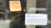 Slice of cheese stuck to storefront window in Chicago becomes viral sensation