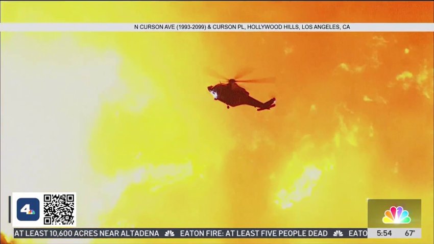 Fire helicopter makes a drop in Hollywood hills