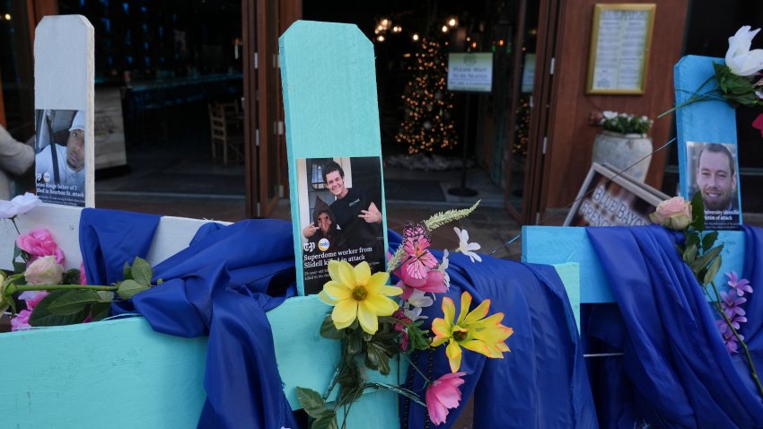 A memorial to the victims of a deadly truck attack is seen on Canal Street