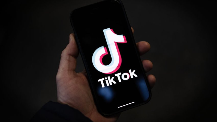 In this photo illustration, a TikTok logo is displayed on an iPhone on February 28, 2023 in London, England.