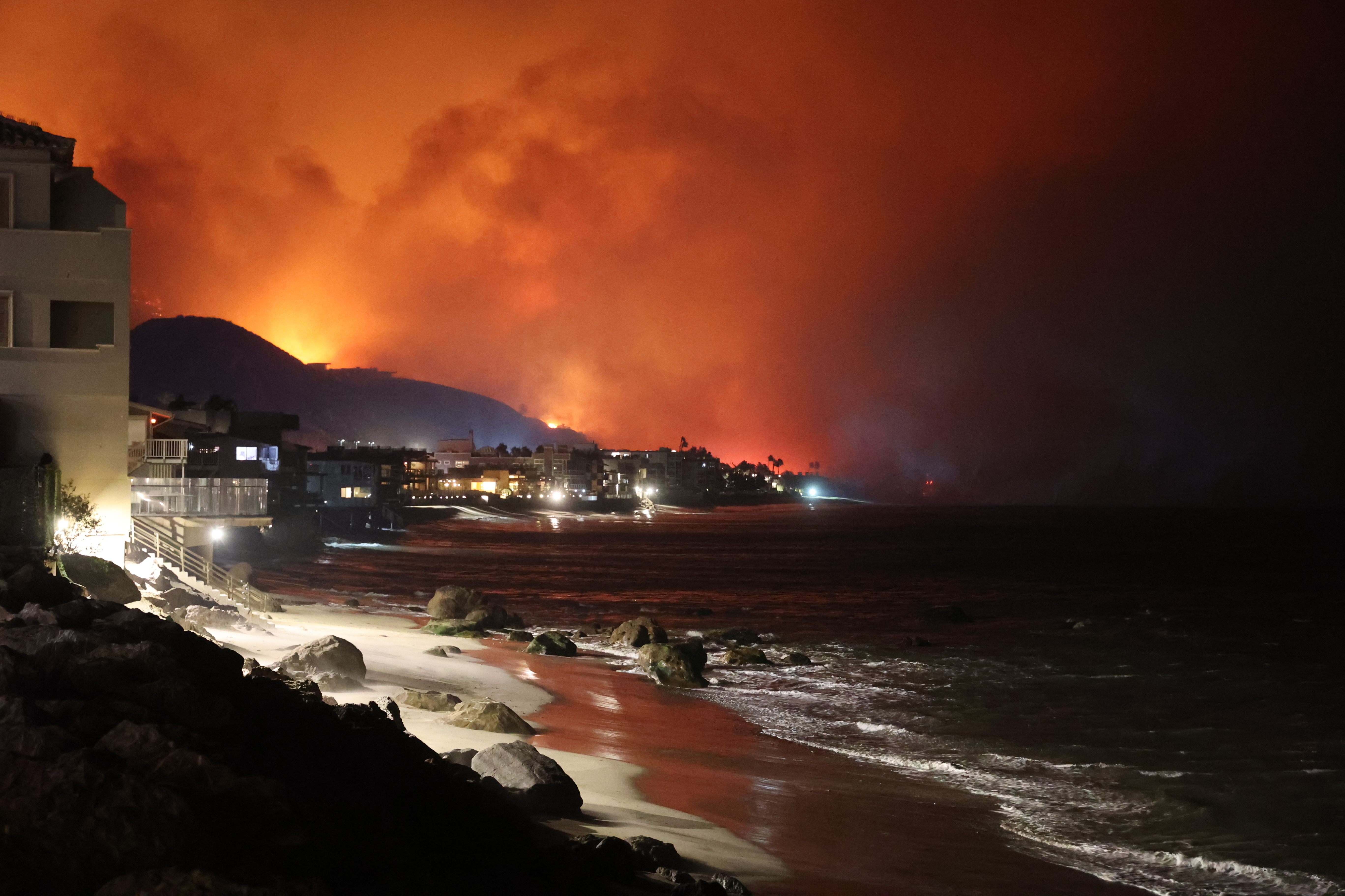 A view of the coast as flames rage across Los Angeles, California, United States on January 09, 2025.